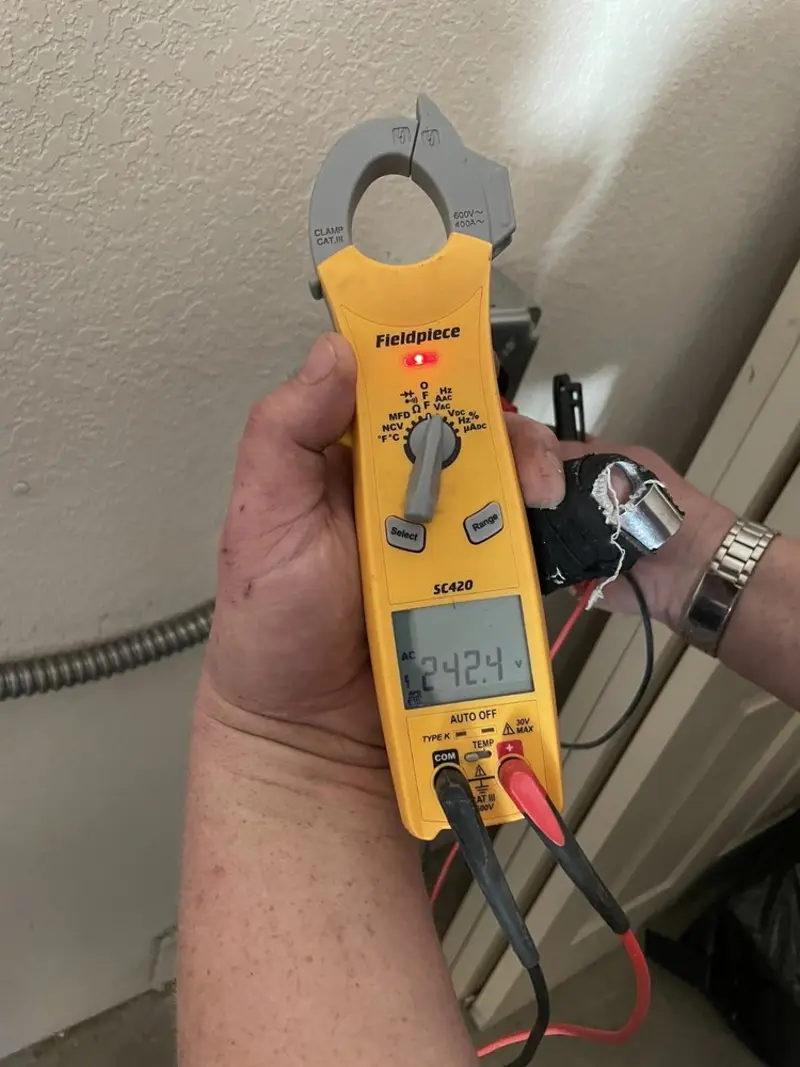 Voltage testing with clamp meter during Generator Installation in Blaine